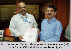 Mr.Nandkumar Menon, Manager-Alliances, Avenues(left) with Senior Official of Karnataka Bank(right)